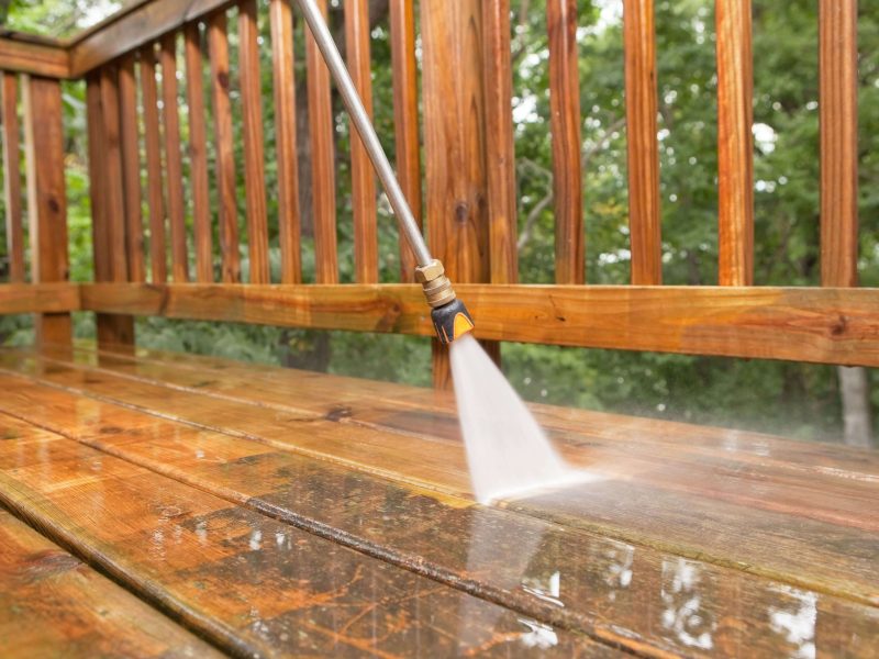 pressure-washer-cleaning-a-weathered-deck-171356261-5810fd5d5f9b58564c69c9c6